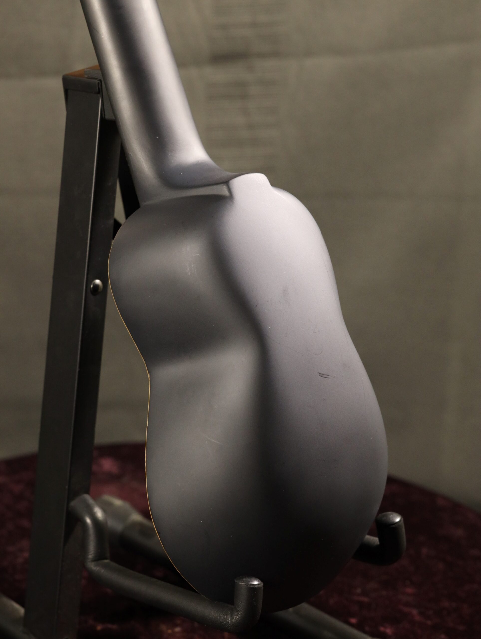 charango in black satin carved back