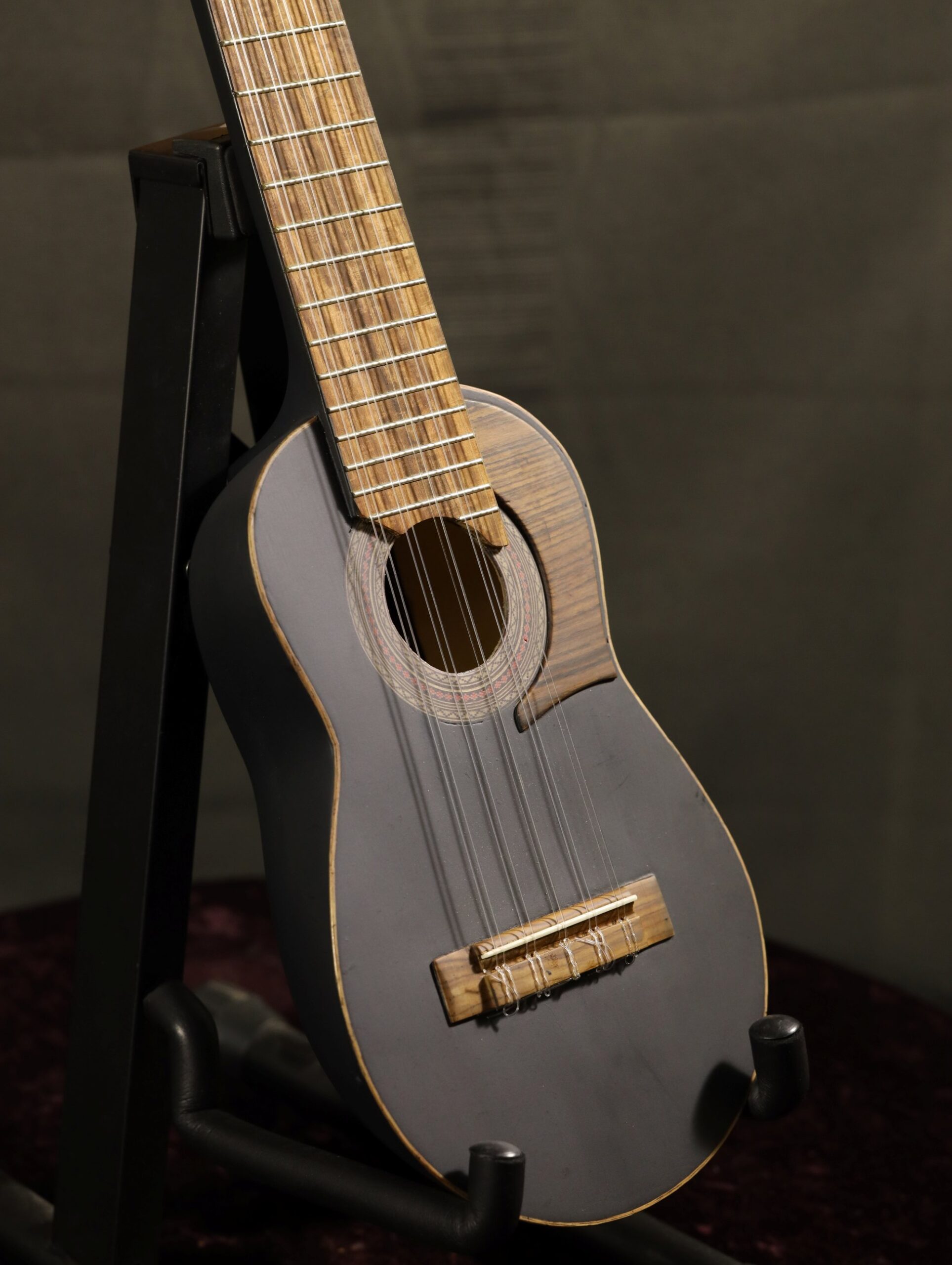 charango in black satin front